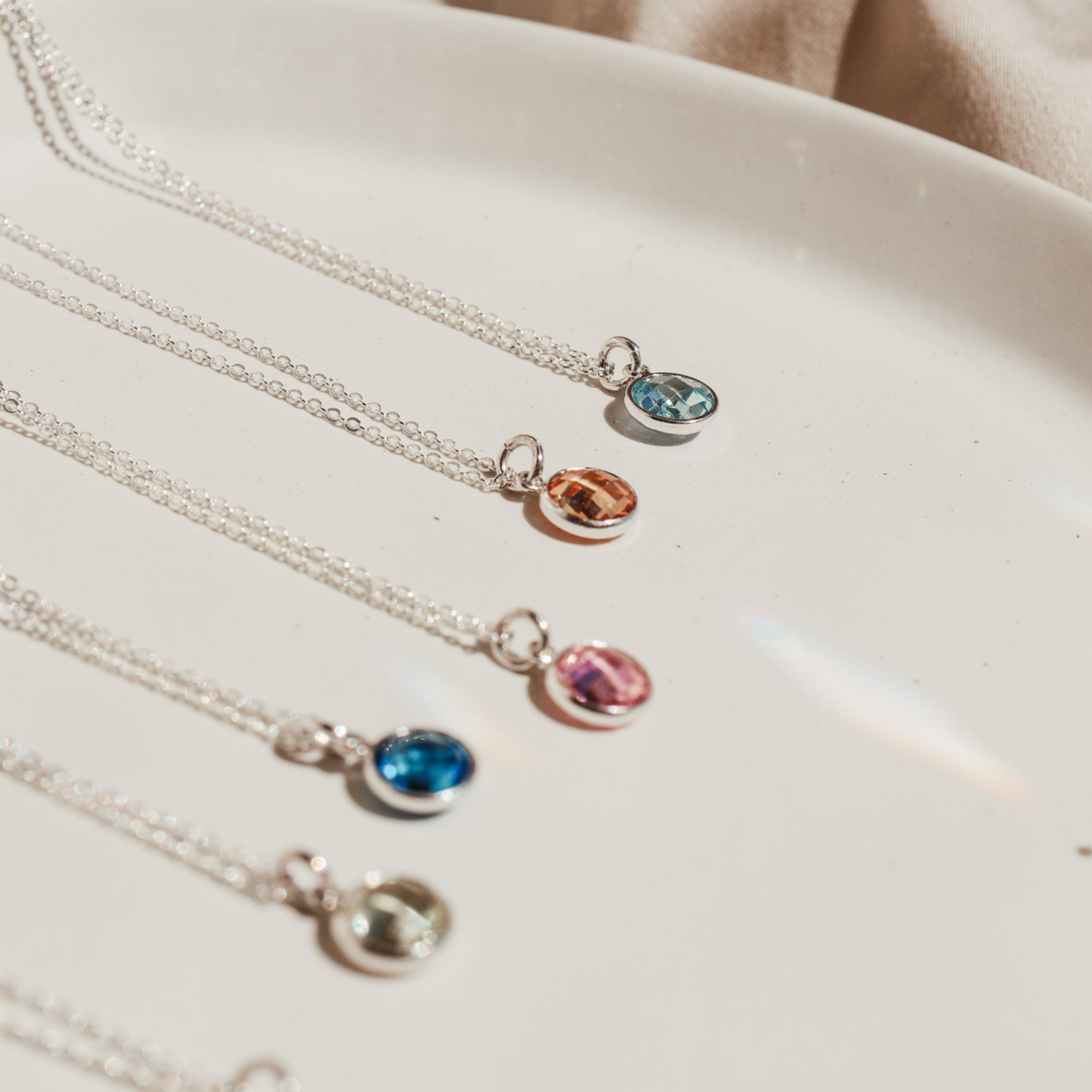 Personalised jewellery – handmade jewellery – KBN jewellery – Australian made jewellery – crystal necklace – birthstone drop necklace – birthstone pendant for necklace – crystal necklace – birthstone jewellery – light blue stone pendant – blue birthstone for necklace – December birthstone pendant – September birthstone drop