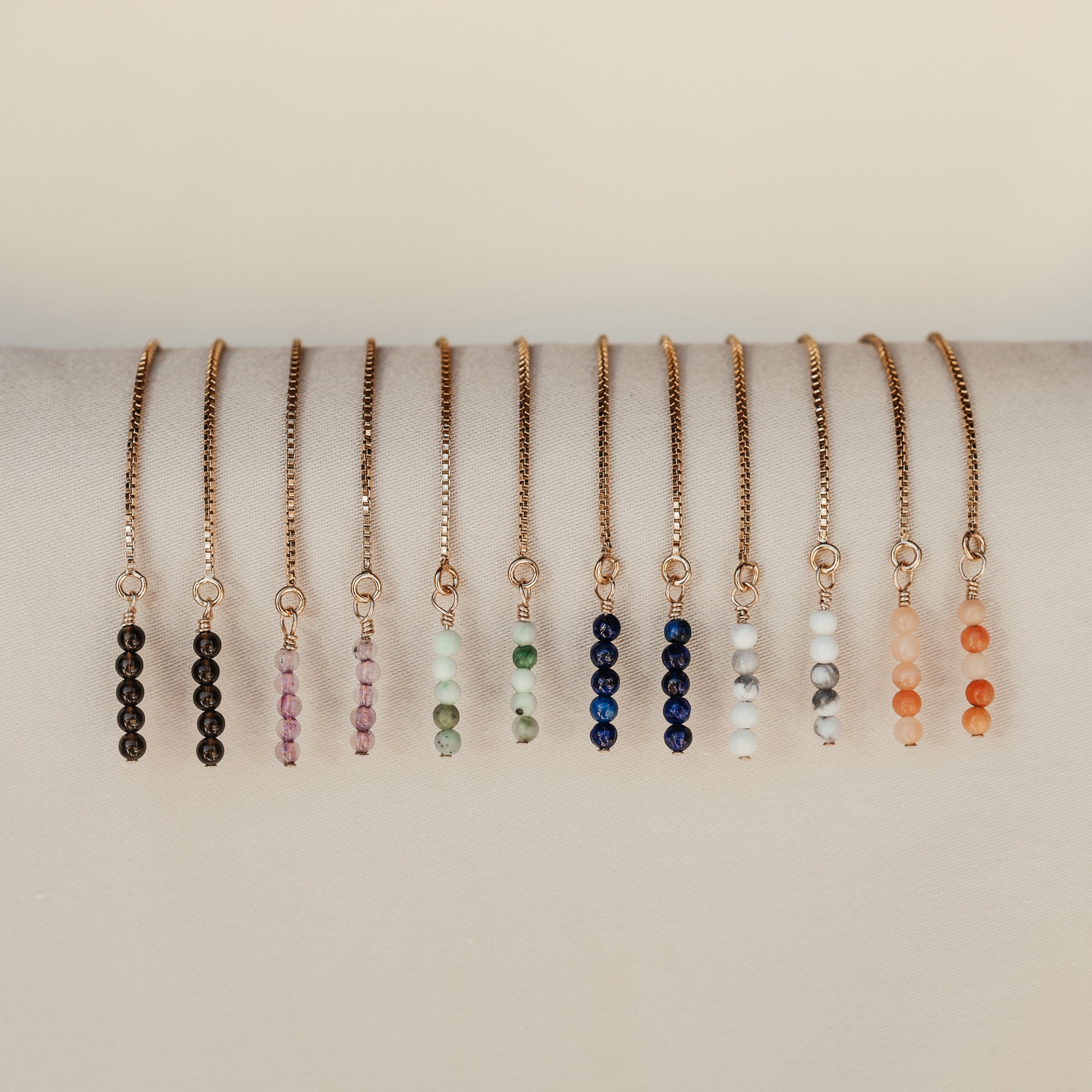Personalised jewellery - KBN Jewellery - handmade jewellery – Personalised Jewellery gifts – Australian Made – gemstone necklace – blue lapis thread through earrings – green jade lapis thread through earrings – amethyst lapis thread through earrings – black obsidian lapis thread through earrings – peach aventurine lapis thread through earrings – white howlite lapis thread through earrings – gemstone stack lapis thread through earrings – thread through gemstone earrings