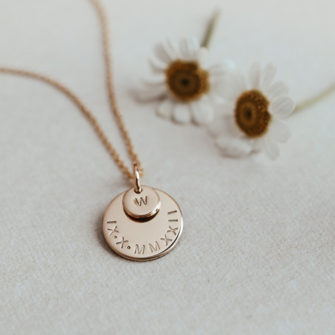 Personalised jewellery - KBN Jewellery - handmade jewellery – stacked pendant necklace – textured pendant – children’s name necklace – necklace for mum – birth flower symbol necklace – everyday necklace – perfect gift – small pendant stack – roman numeral pendant