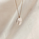 Personalised jewellery – handmade jewellery – KBN jewellery – Australian made jewellery – initial necklace – birth flower necklace – single pendant necklace with flower – birth flower necklace custom – custom birth month necklace – birth flower necklace with initial – oval pendant necklace – flower stamped necklace