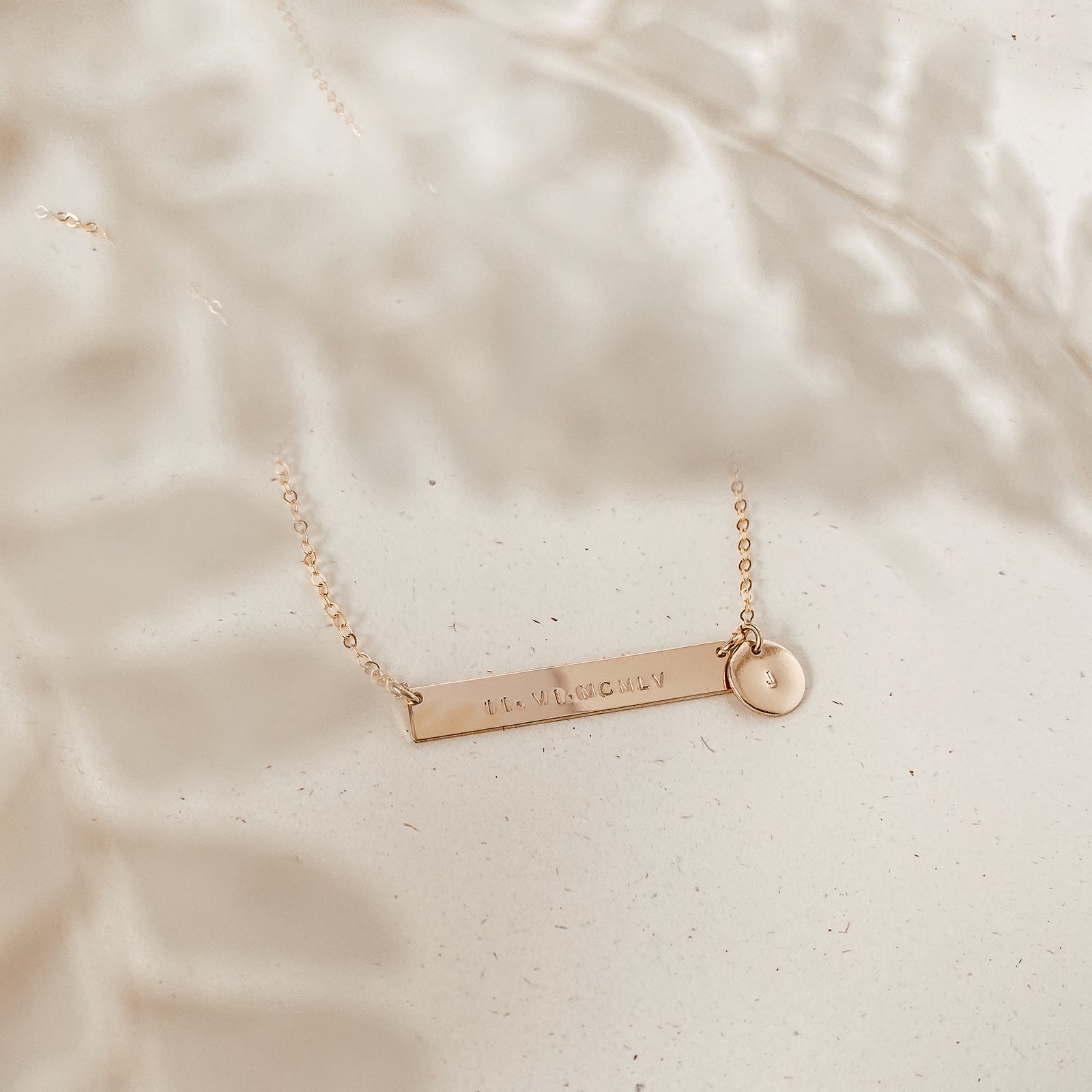 Personalised jewellery - KBN Jewellery - handmade jewellery – Personalised Jewellery gifts – Dainty jewellery- bar necklace – dainty bar necklace – personalised date necklace – roman numerals necklace – name bar necklace – words of affirmation necklace – long bar necklace – layering necklace – layering necklace inspiration – wedding gift idea – wedding gift idea for bride - long pendant necklace with additional small pendant – unique necklace – personalised bar necklace