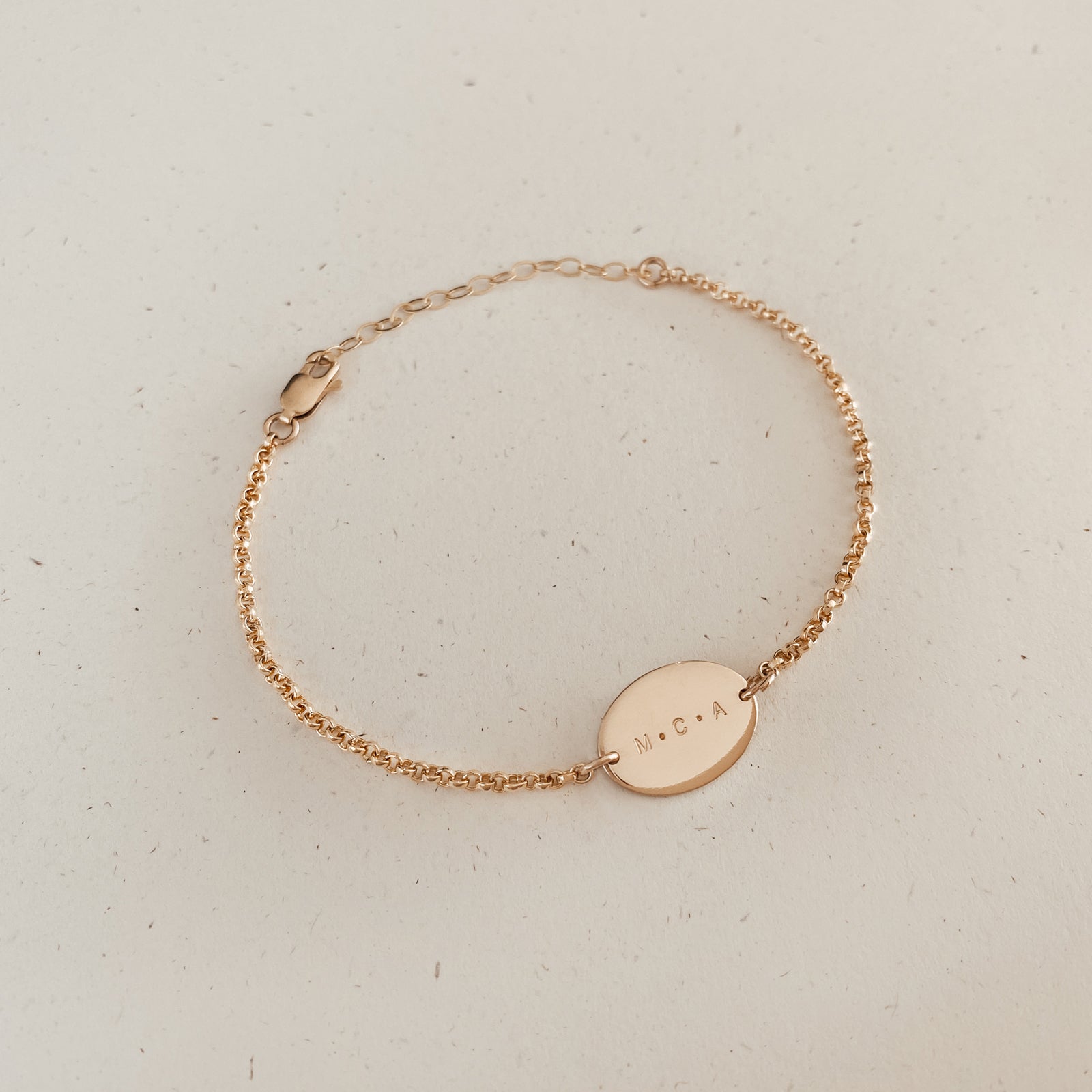 Personalised jewellery – handmade jewellery – KBN jewellery – Australian made jewellery – medium oval bracelet – oval pendant bracelet – initial bracelet – name bracelet – symbol bracelet – gift ideas for women – gift ideas with meaning – sentimental gift ideas