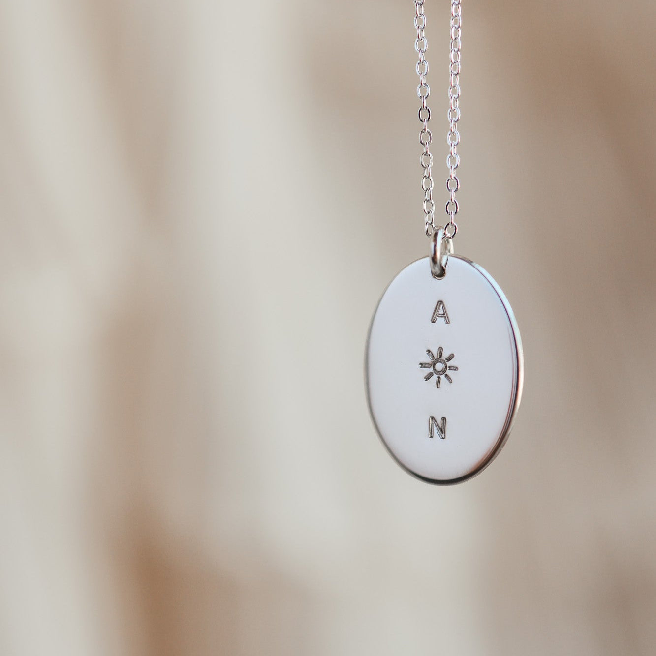 Why We Don’t Stamp on Both Sides of Your Pendant