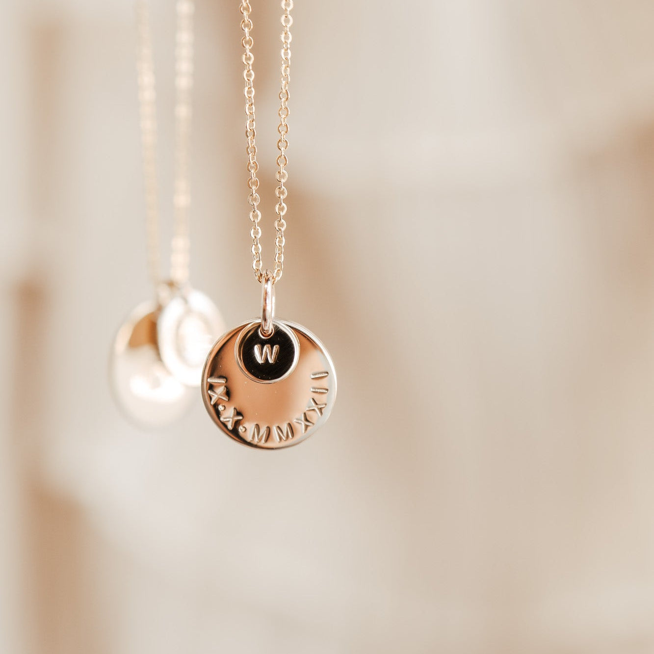 Personalised jewellery - KBN Jewellery - handmade jewellery – stacked pendant necklace – textured pendant – children’s name necklace – necklace for mum – birth flower symbol necklace – everyday necklace – perfect gift – small pendant stack – roman numeral pendant 