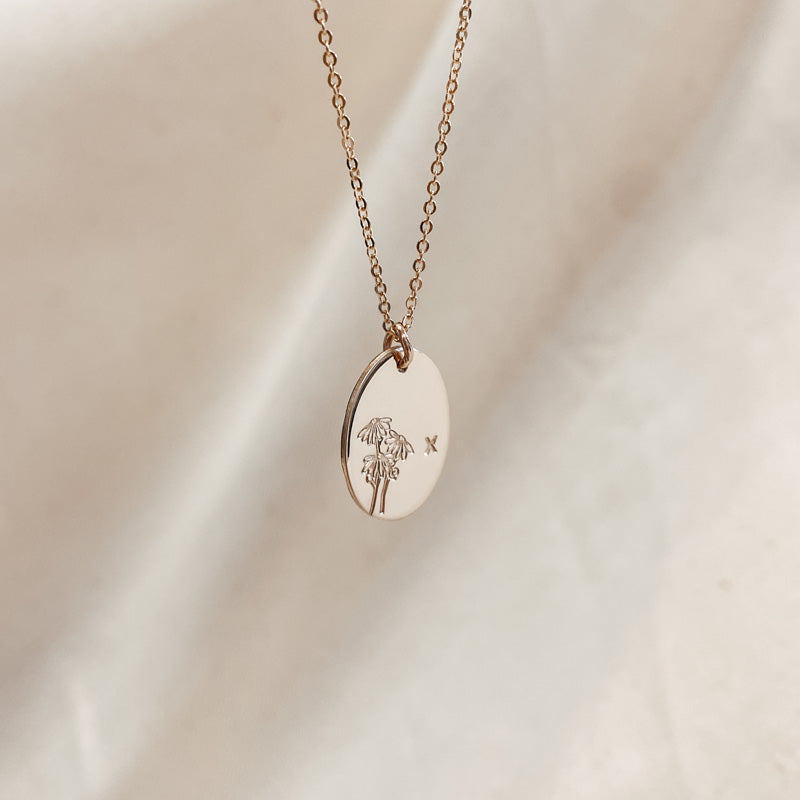 Personalised jewellery – handmade jewellery – KBN jewellery – Australian made jewellery – initial necklace – birth flower necklace – single pendant necklace with flower – birth flower necklace custom – custom birth month necklace – birth flower necklace with initial – oval pendant necklace – flower stamped necklace