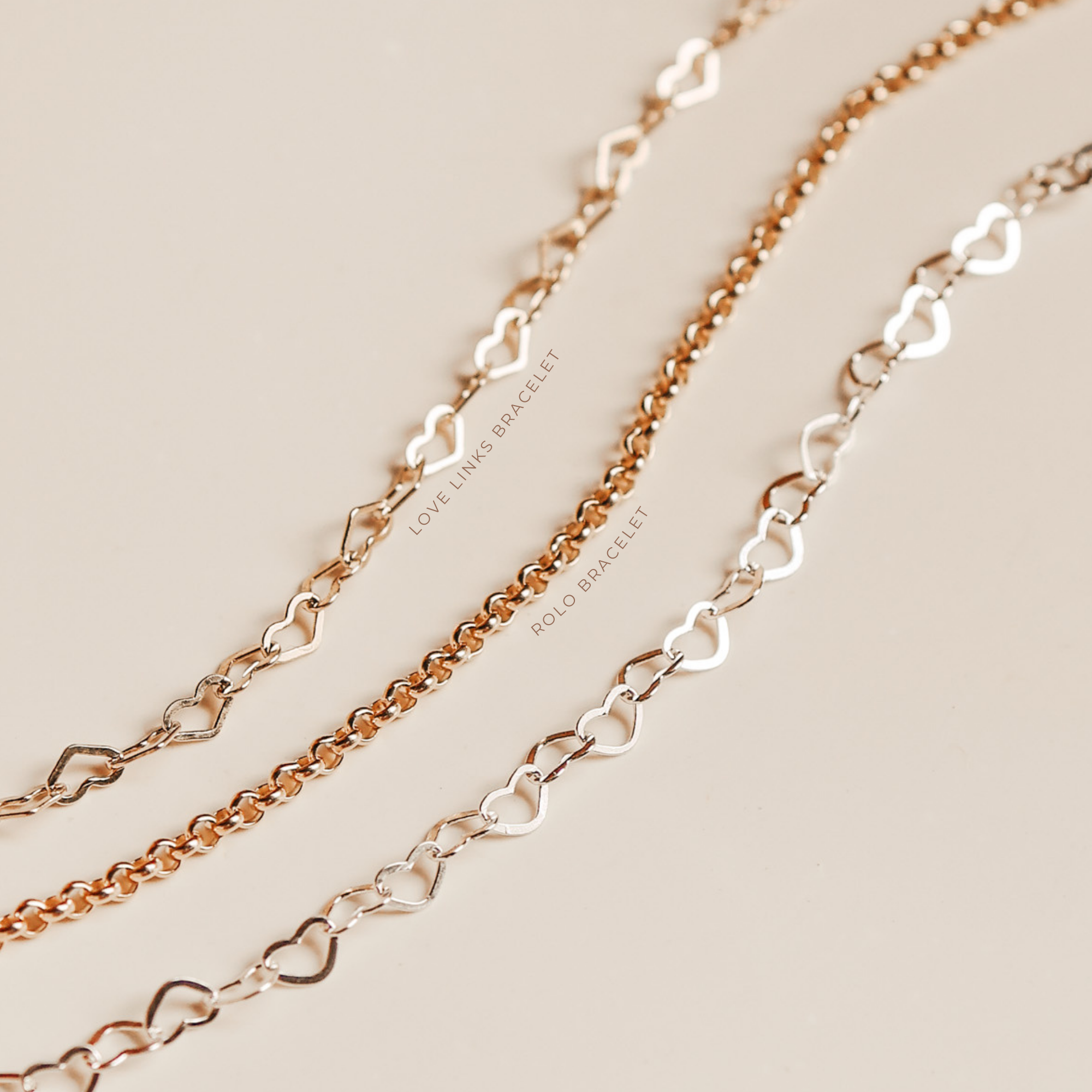 rolo bracelet, stacked bracelet flatlay featuring the rolo chain bracelet and a heart chain bracelet gold filled bracelet stacking bracelet