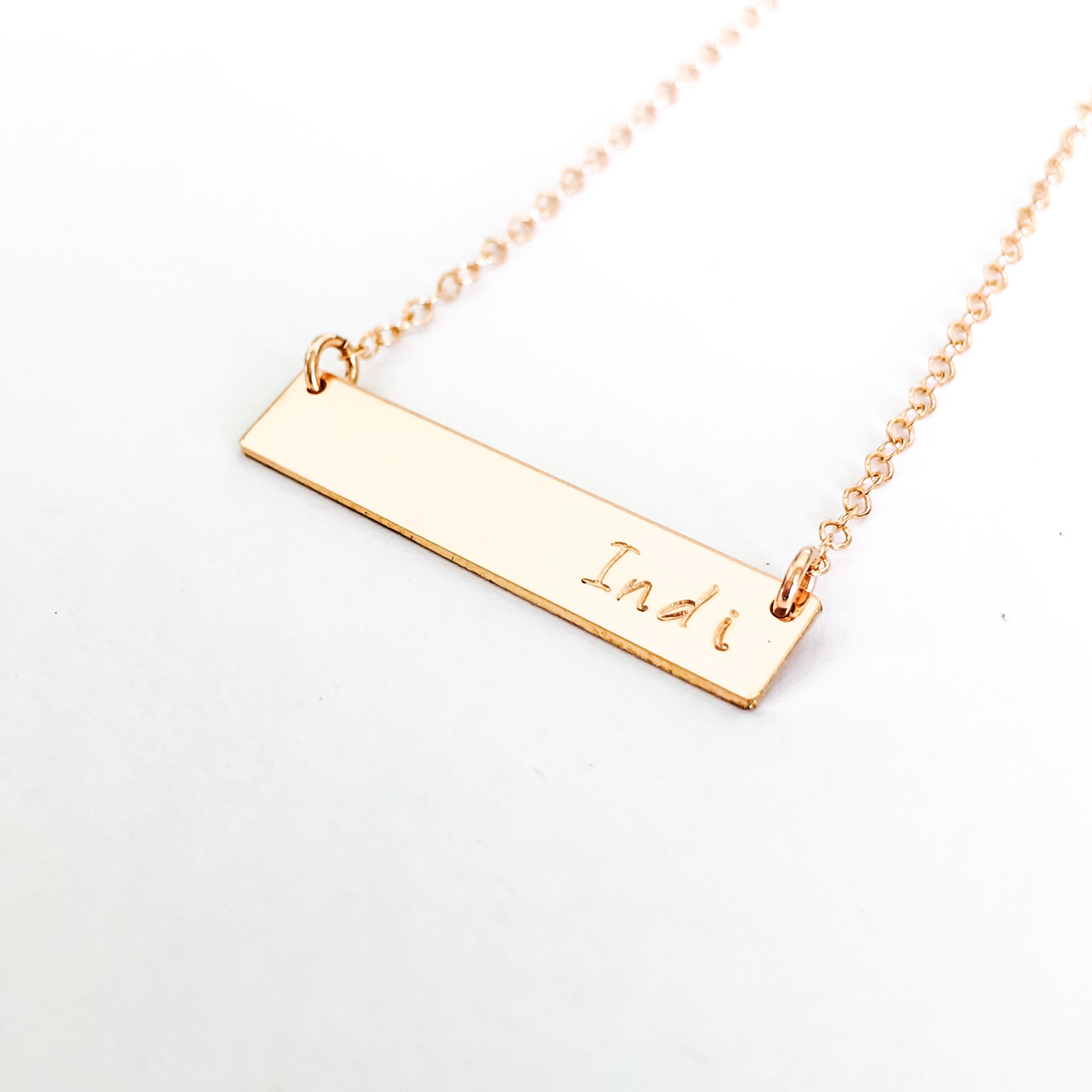 Personalised jewellery - KBN Jewellery - handmade jewellery – Personalised Jewellery gifts – Dainty jewellery- bar necklace – dainty bar necklace – personalised date necklace – roman numerals necklace – name bar necklace – words of affirmation necklace – short bar necklace – layering necklace – layering necklace inspiration – wedding gift idea – wedding gift idea for bride  - long pendant necklace – small bar necklace 
